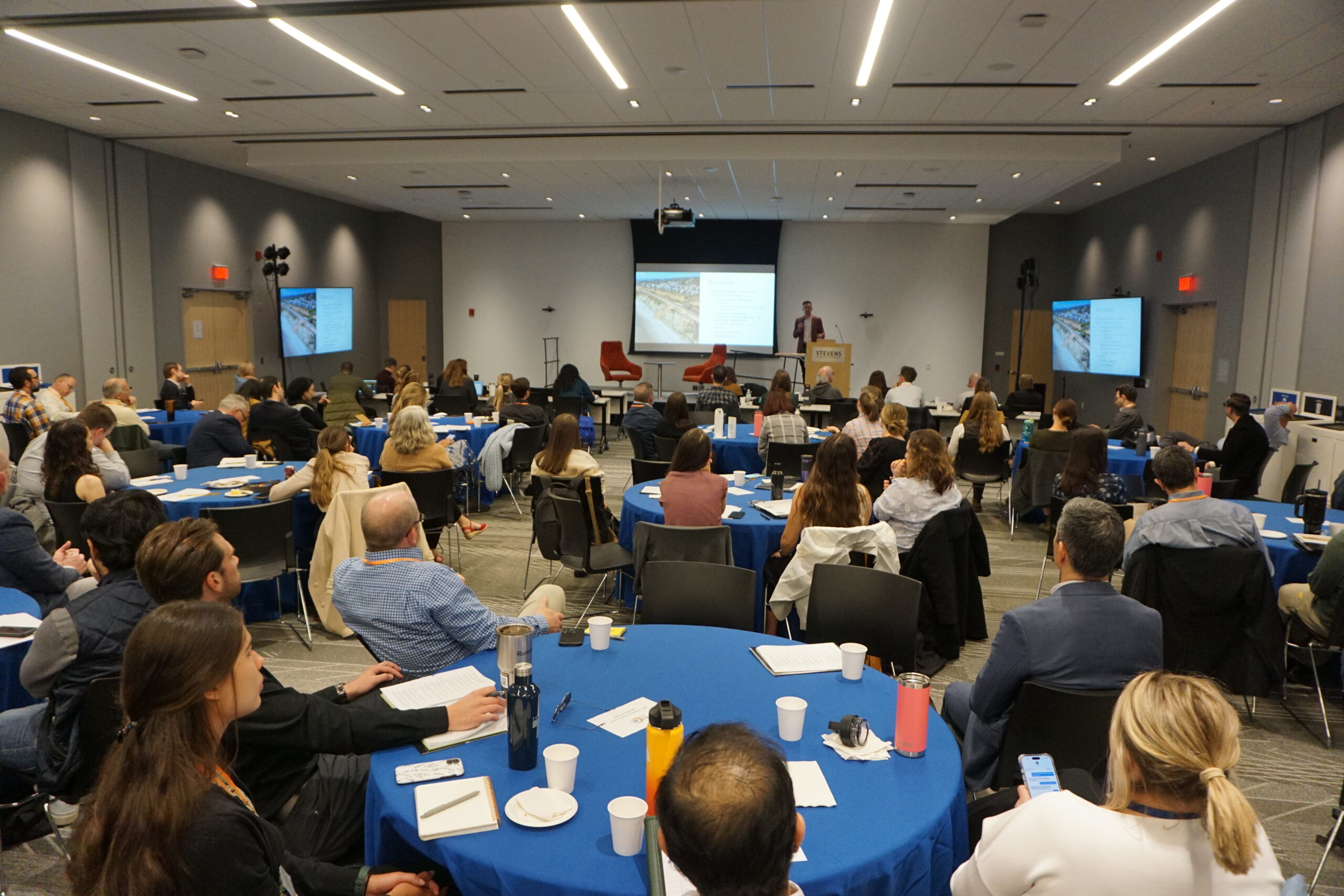A view of the crowd of attendees watching a speaker at the workshop.