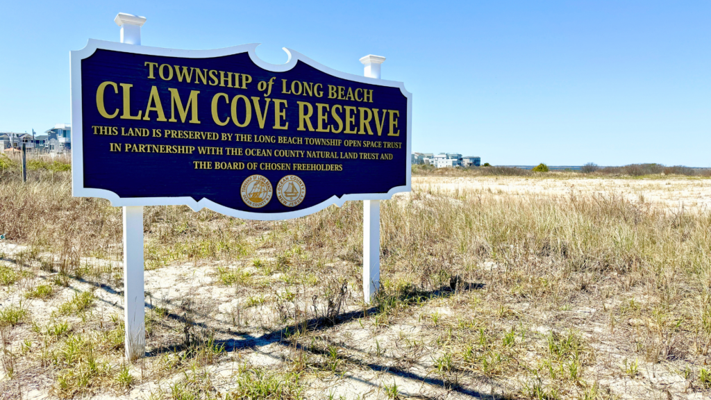 A sign at the Clam Cove Reserve waterfront area